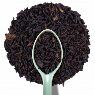 Sachet vrac 200g thé noir Les Biscuits de Maman Alveus, parsemé d'éclats de noisettes, de cannelle et de morceaux de biscuits.