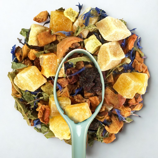 Sachet vrac 200g infusion Soleado, mélange coloré de morceaux de kiwi, cerises entières et cubes de pastèque.