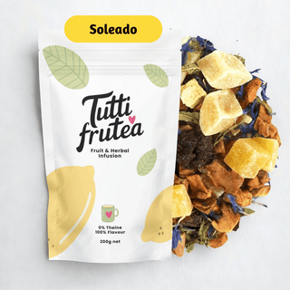 Sachet vrac 200g infusion Soleado, mélange coloré de morceaux de kiwi, cerises entières et cubes de pastèque.